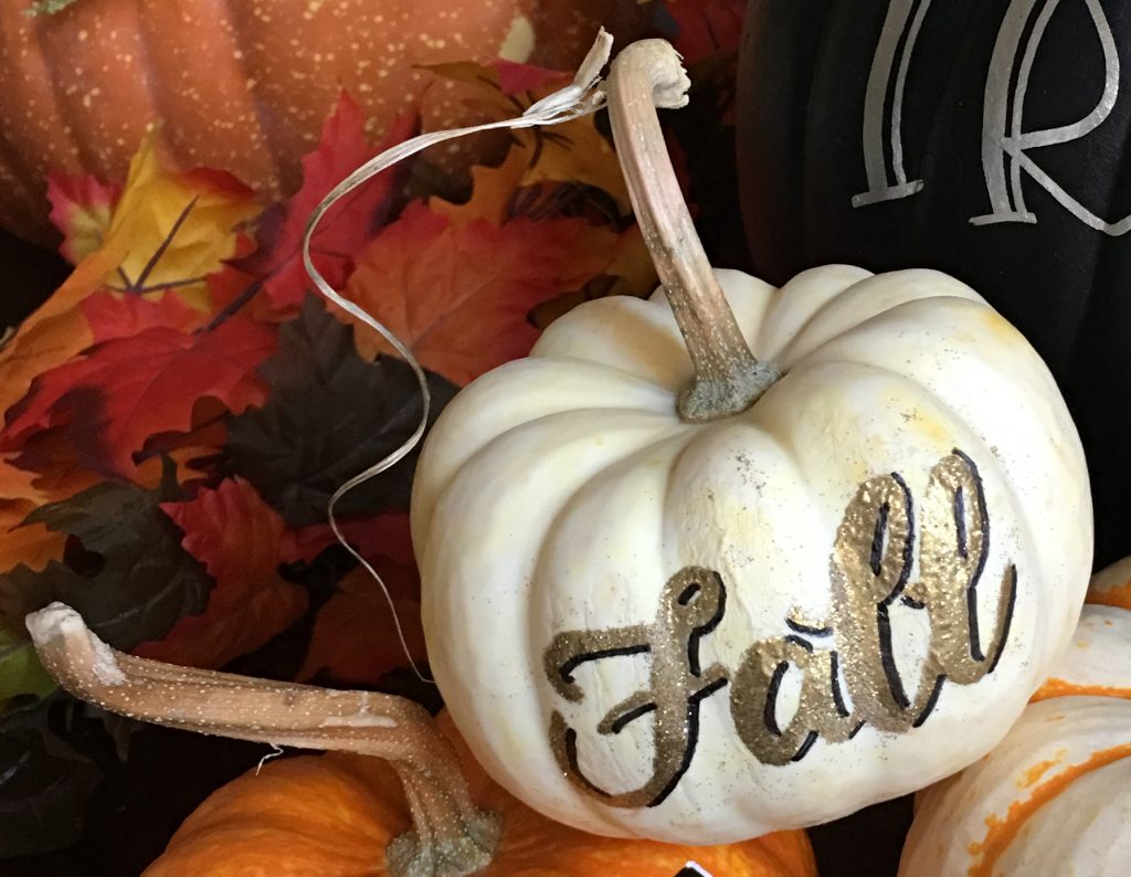 trick or treat on a pumpkin hand lettering kellyklapstein