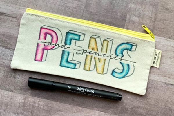 Amazing hand lettering on a canvas pen pouch pencil case tutorial www.kellycreates.ca